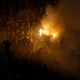 Illustration for article titled Smoke, Flares, Riot Police In Belgrade Derby Make For Haunting Photos